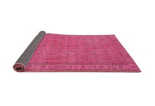 2' x 3' Neon Hot Pink Traditional Persian Runner Rug angled product view highlighting the bold neon pink color and classic patterned design.
