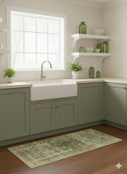 2' x 3' Olive Green Cream / Off-White Vintage Distressed Runner Area Rug  placed in a bright modern farmhouse kitchen.