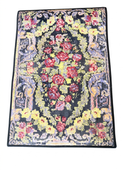 2' x 3' Rectangular Black & Multicolor Floral Medallion Vintage Traditional Area Rug isolated on a white background.