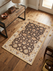 2' x 3' Rectangular Brown & Ivory Floral Traditional Washable Area Rug placed in a rustic entryway beside a wooden console table.