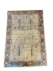 2' x 3' Rectangular Ivory Blue Geometric Tribal Traditional Area Rug isolated on a white background.