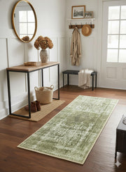 2' x 5' Olive Green Cream / Off-White Modern Distressed Runner Rug placed in a bright entryway with wood floors and farmhouse decors.  