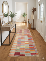 2' x 5' Runner Multi-Color Patchwork Striped Bohemian Area Rug styled in an entryway hallway.