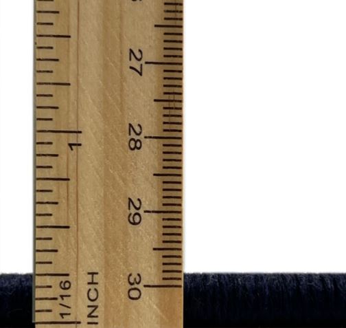 2' x 5' Runner Purple Violet Abstract Area Rug shown with a ruler measuring the rug thickness and pile height.