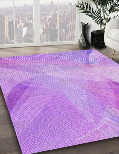2' x 5' Runner Purple Violet Abstract Area Rug styled in a bright living room with large windows and indoor plant decor.