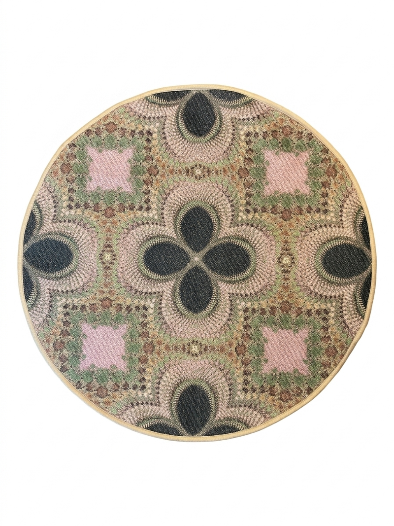 3' Round Pink Green Geometric Bohemian Washable Area Rug displayed on a white background, highlighting its circular geometric pattern with soft pink, green, beige, and charcoal tones.