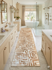 3' x 8' Runner Beige & Ivory Geometric Abstract Modern Washable Area Rug placed in a luxurious bathroom with marble flooring, a freestanding tub, and elegant transitional décor.