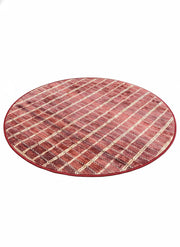 4' Round Muted Rose Warm Beige  Area Rug featuring a vibrant striped textured pattern 
