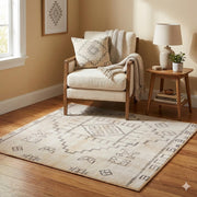 4' x 4' Square Ivory Taupe Light Gray Geometric Area Rug placed in a welcoming entryway with wood floors and console table..