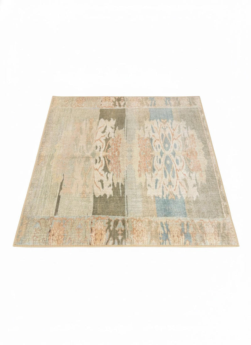4' x 4' square transitional area rug featuring a beige base with multi-color ikat-inspired abstract patterns in soft blue, sage green, and muted coral tones.
