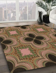 4' x 6' Bronze Brown Pink Patterned Super Soft Cloud Area Rug angled perspective view displaying the repeating decorative motif and plush appearance.
