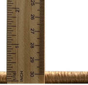 4' x 6' Bronze Brown Pink Patterned Super Soft Cloud Area Rug thickness measurement view showing the low-profile pile height beside a ruler for scale.