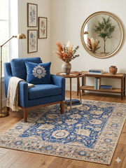 4' x 6' Rectangular Blue & Ivory Floral Traditional Area Rug styled in a cozy sitting area with classic décor.
