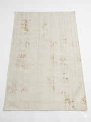 4' x 6' Rectangular Ivory & Gold Distressed Abstract Modern Washable Area Rug displayed on a plain background.