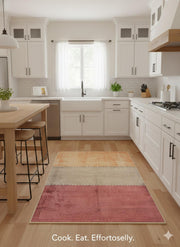 4' x 6' Rectangular Multi Color & Neutral Color-Block Stripe Modern Area Rug placed in a bright white kitchen with shaker cabinets, wood countertops, bar stools, and light hardwood floors.