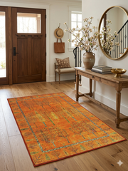 4' x 6' Rectangular Orange Multicolor Botanical Traditional Washable Area Rug styled in an entryway.