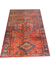 4' x 6' Rectangular Rust Red & Blue Tribal Geometric Medallion Traditional Area Rug isolated on a white background.