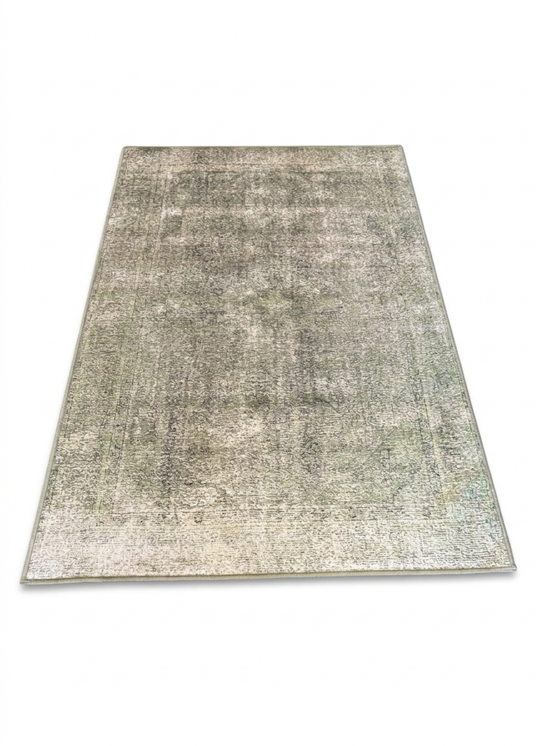 5' x 7' Rectangular Blue Distressed Medallion Traditional Washable Area Rug isolated on a white background.