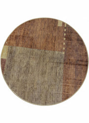 5' Round Brown & Beige Geometric Distressed Modern Area Rug top view displaying the round shape and abstract geometric blocks in warm brown, beige, and taupe tones.
