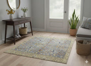 5' x 5' Square Antique Ivory Soft Steel Blue Vintage Floral Area Rug placed in a welcoming entryway with wood floors and console table.