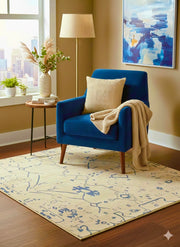 5' x 5' Square Blue & Ivory Cream Abstract Modern Area Rug placed in a cozy living room reading nook setting.