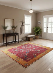 5' x 5' square red and gold floral traditional area rug styled in an entryway with light wood floors and neutral decor.