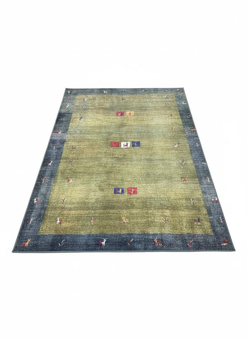5' x 7' Olive Green & Slate Blue Minimalist Border Area Rug placed in a cozy room with natural lighting.