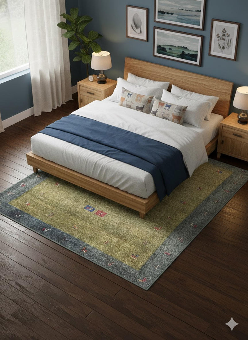 5' x 7' Olive Green & Slate Blue Minimalist Border Area Rug styled in an elegant bedroom with wood nightstands.