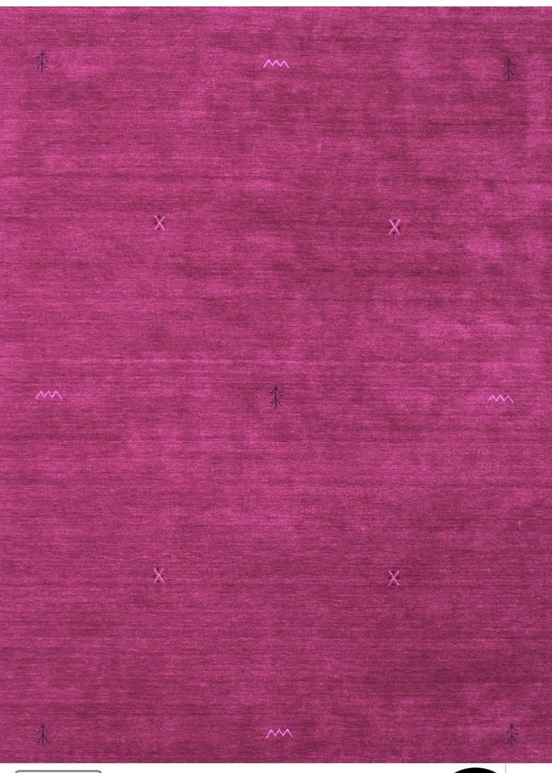 5' x 7' Rectangle Magenta Purple Minimalist Solid Area Rug close-up view highlighting the soft texture and subtle minimalist stitched accents on the magenta surface.