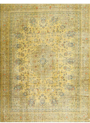 5' x 7' Rectangle Warm Gold / Antique Yellow Distressed Floral Traditional Area Rug close-up view highlighting the intricate floral pattern and vintage-inspired distressed details.