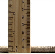 5' x 7' Rectangular Beige Antique Gold Distressed Medallion Vintage Area Rug detail view showing the low-profile pile height with measuring ruler for scale.