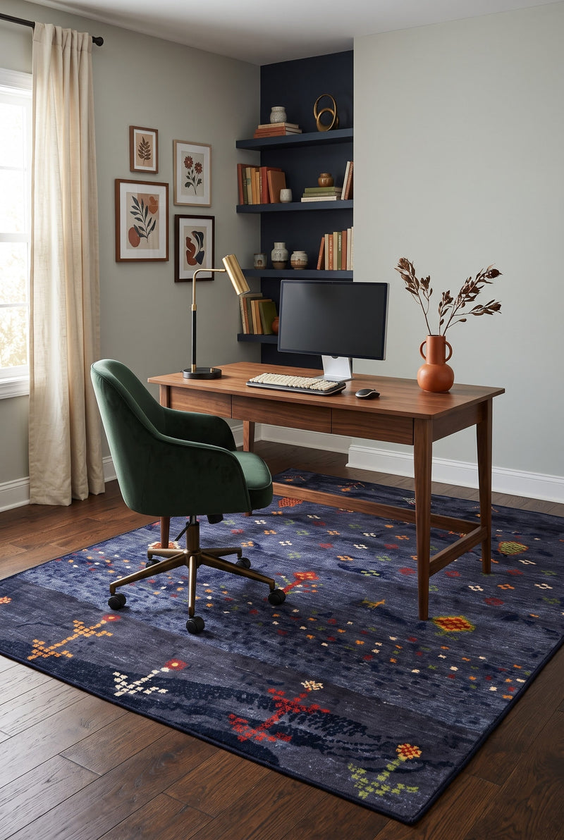 5' x 7' Rectangular Navy Blue Multicolor Tribal Geometric Bohemian Area Rug styled in a home office with a wooden desk and green office chair.