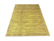 5' x 7' Rectangular Olive Green & Gold Solid Textured Modern Washable Area Rug featuring a softly blended olive green and golden yellow surface with subtle linear texture.