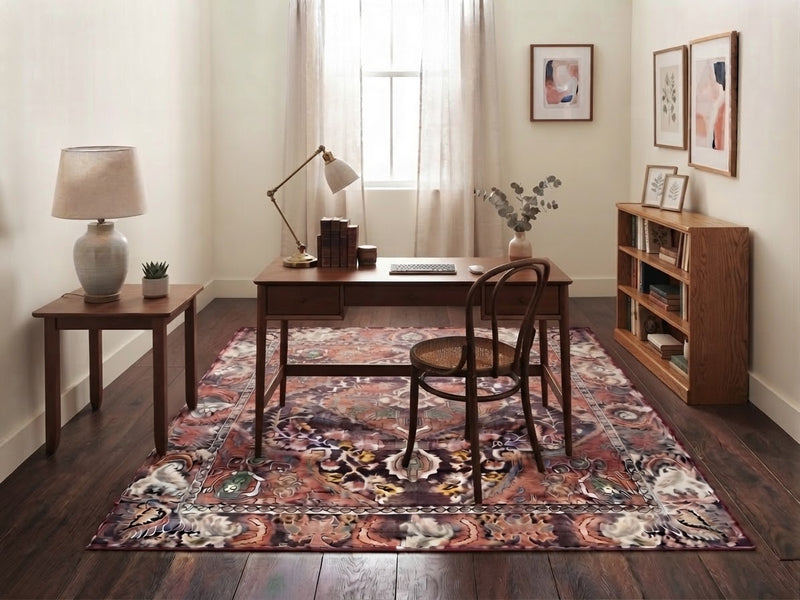 5' x 7' Rectangular Rust Red & Burgundy Floral Medallion Traditional Vintage Area Rug styled in a home office with a wooden desk and vintage chair.