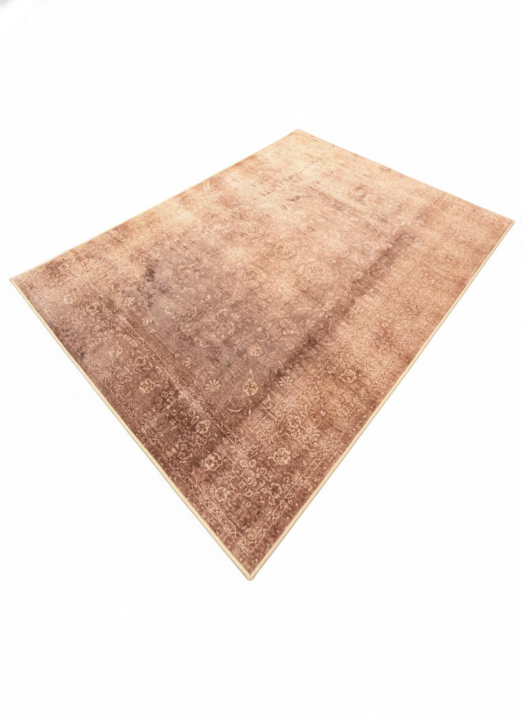 5' x 7' Solid Blush Peach Rose Textured Area Rug displayed on a light neutral background.
