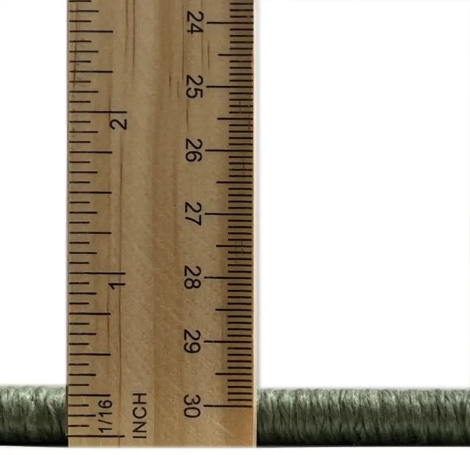 5' x 7' Turquoise Persian Traditional Rug close-up with measuring ruler showing the low pile height and edge finishing detail.