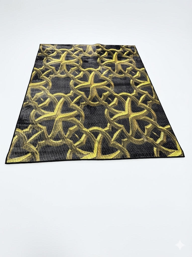 5' x 7' black and gold interlocking geometric rectangular area rug featuring bold overlapping circular patterns on a charcoal background.