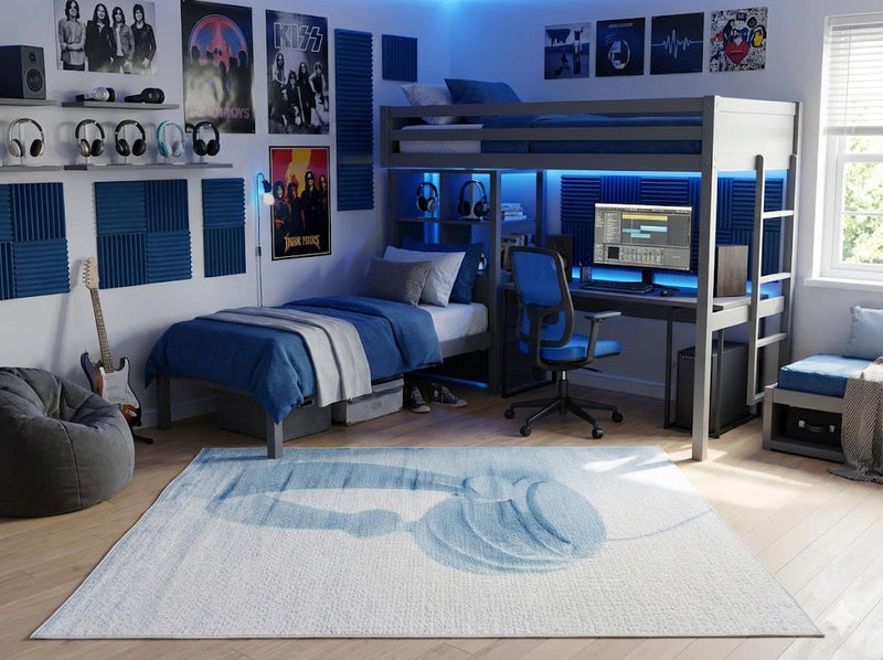 5' x 7' ivory and dusty blue abstract modern rectangular area rug styled in a modern bedroom with a loft bed and desk setup.