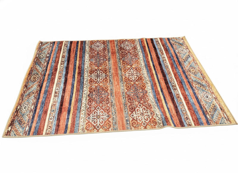 5' x 7' multi color striped geometric tribal rectangular area rug featuring warm rust, blue, and cream tones with a traditional striped pattern on a clean white background.