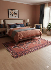 5' x 7' multi color traditional geometric area rug styled in a cozy bedroom with a wood bed frame, layered bedding in warm tones, soft ambient lighting, and light wood flooring.