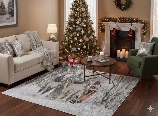 5' x 7' neutral gray, cream & taupe winter wildlife rectangular area rug styled in a cozy holiday living room with a sofa, accent chair, decorated Christmas tree, and warm wood flooring.
