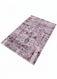 5' x 7' purple tonal rectangular area rug displayed on a clean white background highlighting the modern abstract pattern