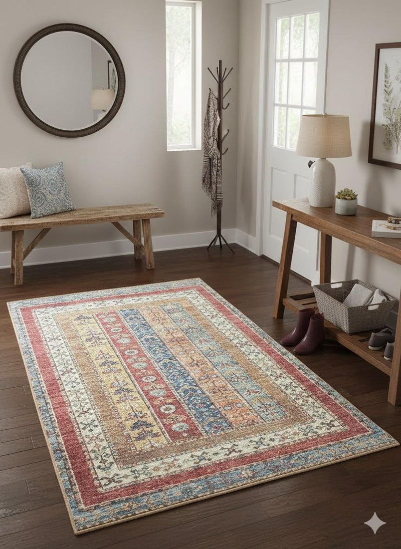 5' x 7' rectangular multicolor geometric distressed traditional area rug styled in a simple entryway with a wooden bench, console table, and dark wood flooring.