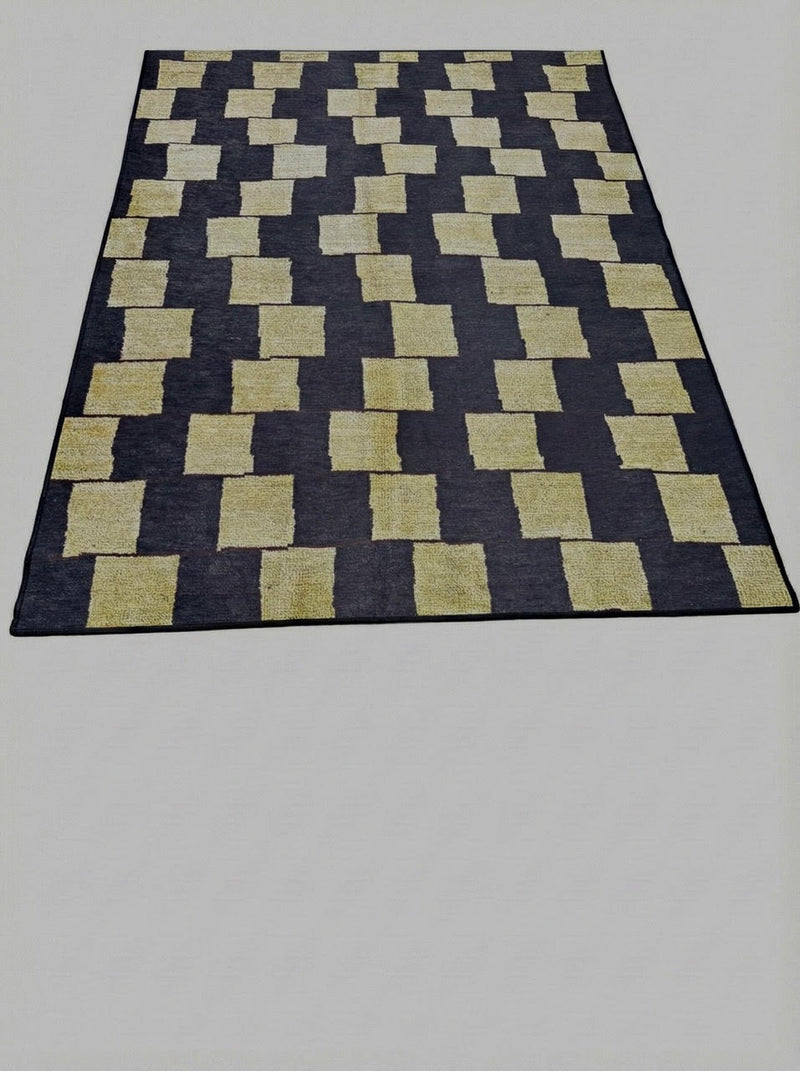 5' x 7' washable area rug featuring a bold navy background with warm ivory checkered squares in a modern geometric pattern.