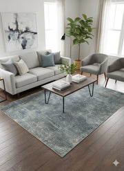 5' x 8' Blue Gray Ivory Solid Modern Rectangular Area Rug styled in a cozy living room seating area.