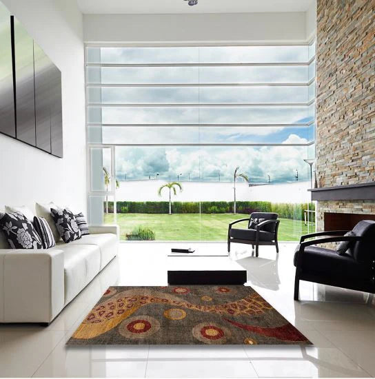 5' x 8' Dark Gold Brown Multi Color Abstract Oriental Area Rug styled in a modern living room, highlighting the bold abstract curves and circular accents.