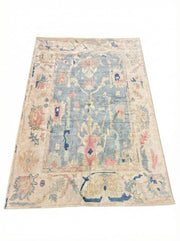 5' x 8' Light Blue Multi Color Pastel Distressed Area Rug displayed on a clean white background highlighting the distressed pattern.