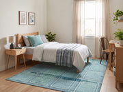 5' x 8' Rectangular Aqua Blue & Teal Distressed Geometric Rectangular Grid Modern Contemporary Area Rug placed beneath a wooden bed with white bedding and a matching nightstand.