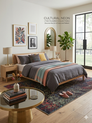 5' x 8' Rectangular Black Multi Color Distressed Ornate Vintage Traditional Area Rug styled in a bedroom.