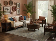 5' x 8' Rectangular Blue Beige Ivory Geometric Tribal Area Rug styled in a cozy living room highlighting the intricate tribal pattern and soft neutral tones.